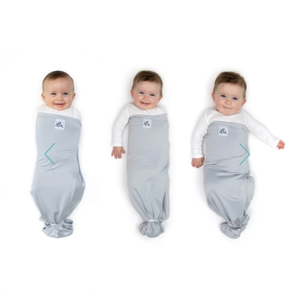 NEW IN BOX Ollie swaddle. Color Stone. One size.